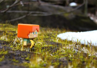 Minecraft玩家在我的世界中文论坛分享的精美城堡建筑作品，欧式风格石砖与木材搭配，画面壮观